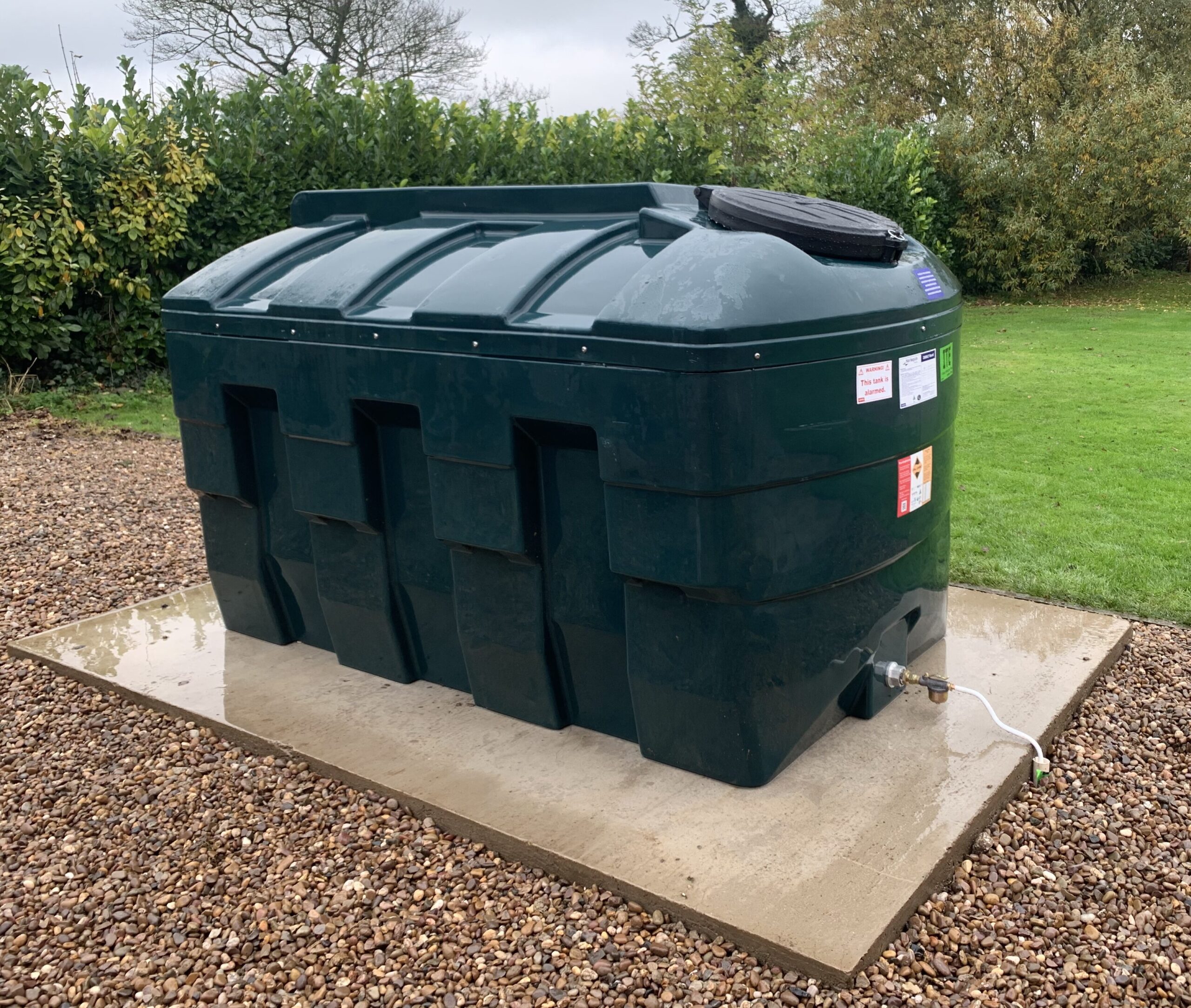 New oil tank installed on a concrete base